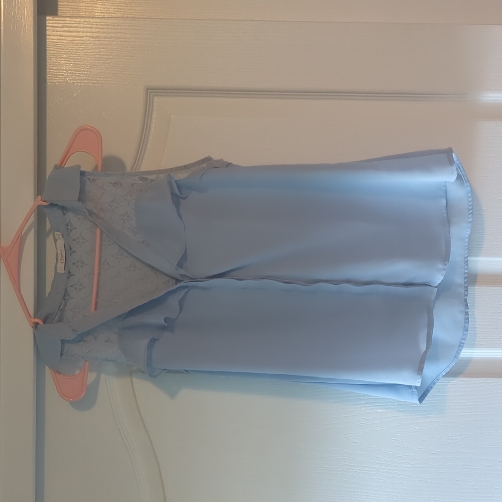 Women's button down sleeveless blouse